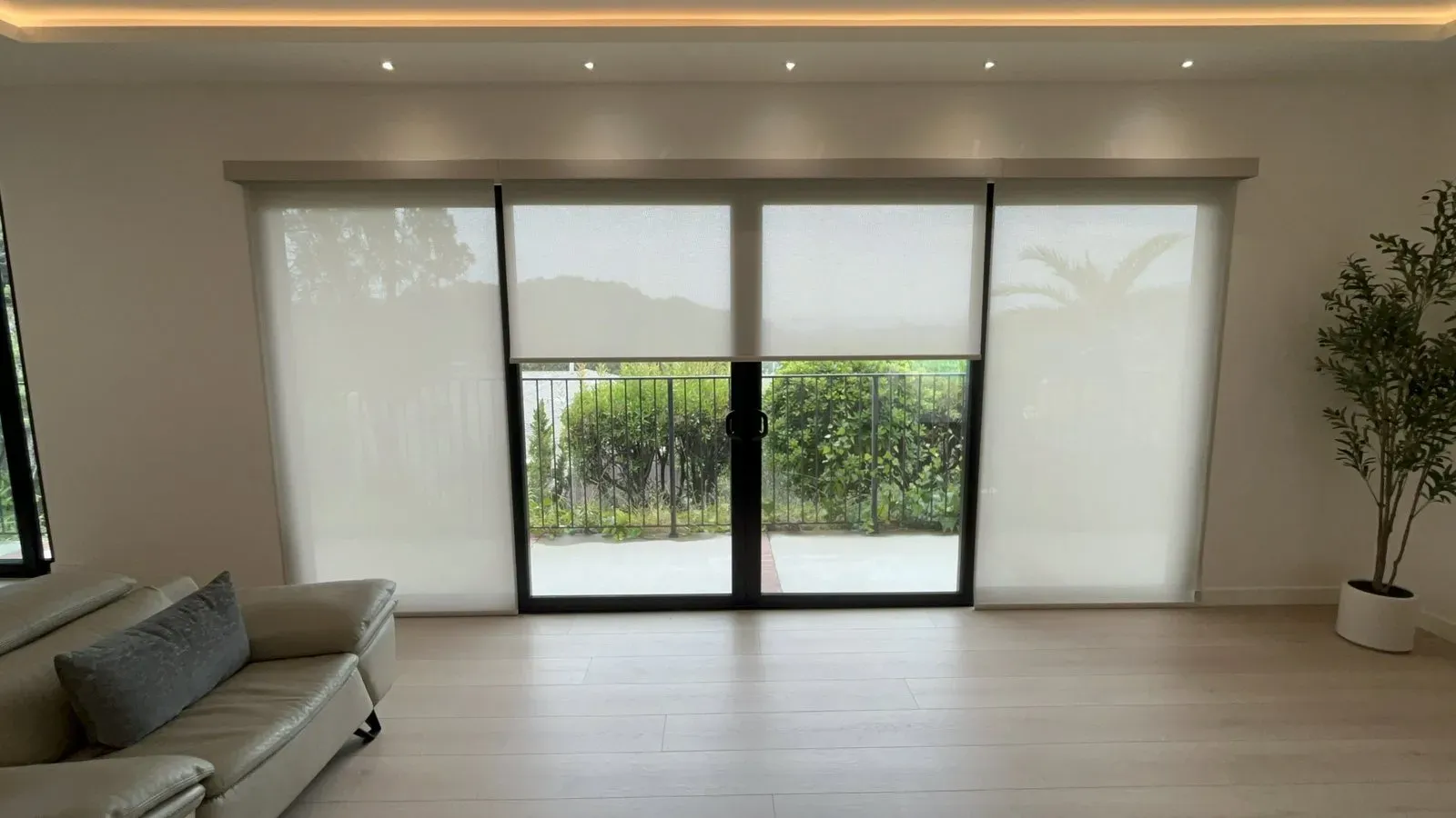 Living Room – Roller Shades Across a Slider Wall